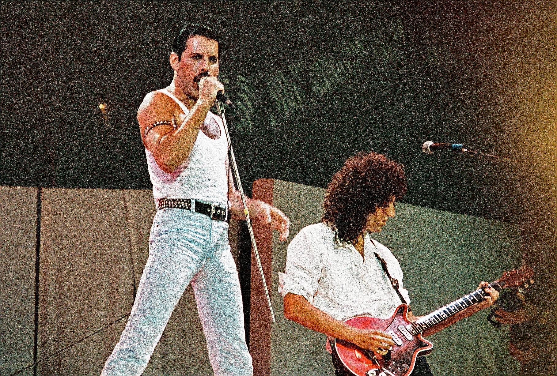 Freddie Mercury of Queen performs on stage at Live Aid on July 13th, 1985
